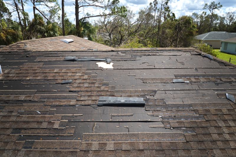 Storm-damaged asphalt roof